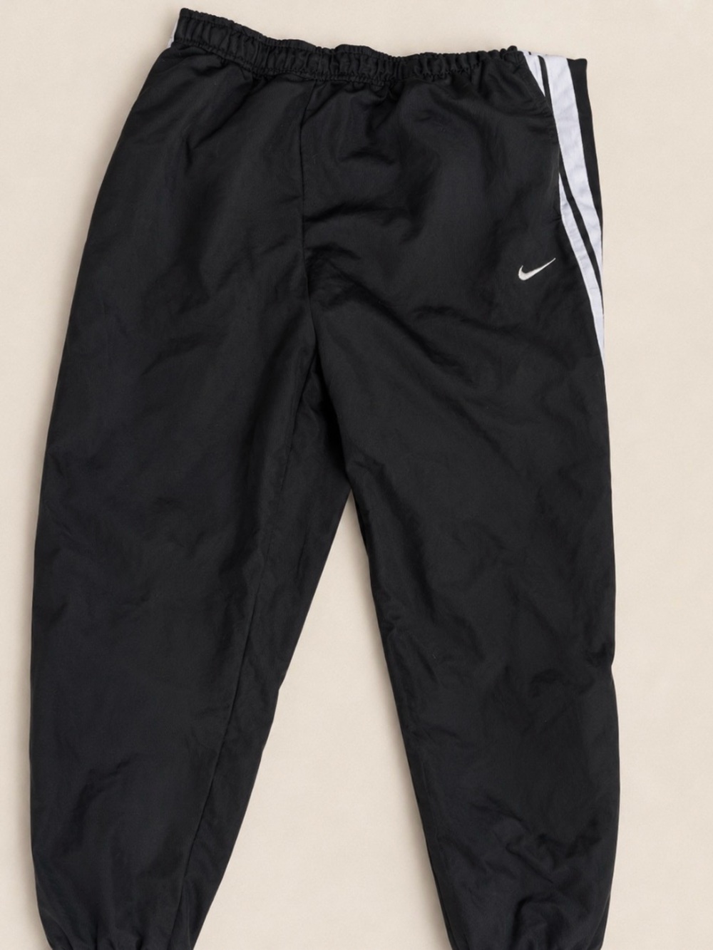 Nike Black Track Pants with White Swoosh and Accent Stripe